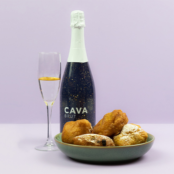 champagne met oliebollen